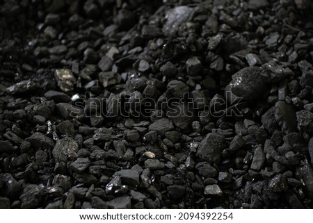 Lots of black coal. Industrial composition
