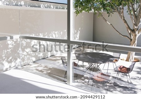 Table and chairs in courtyard