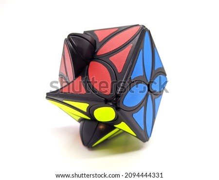 color brain teaser on white background closeup photo