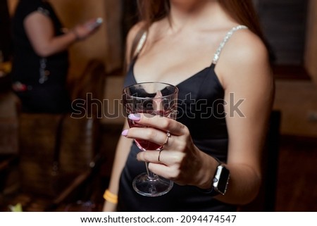 close-up of gorgeous woman with a glass of champagne. party and holiday celebration.