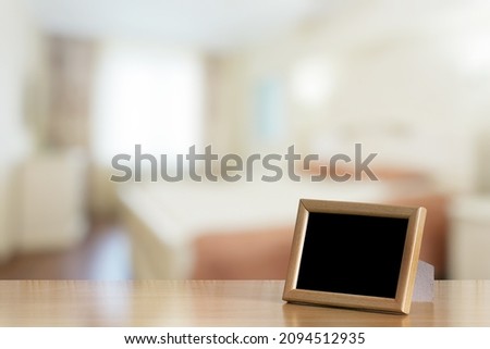 photo frame on the wooden table in the badroom