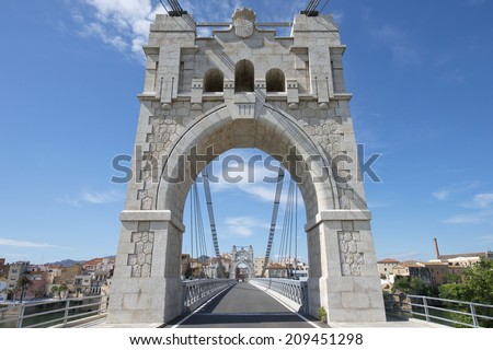 Bridge on the Ebro river in Amposta, Delta del Ebro, Catalonia, Spain Royalty-Free Stock Photo #209451298