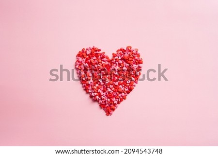 Happy Valentines Day composition. Heart made of heart shaped sweets. Creative layout, flat lay.