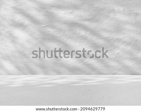 Gray background with natural shadows with light from the window