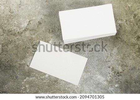 stack of business cards blank mockup on grunge background mocap for design