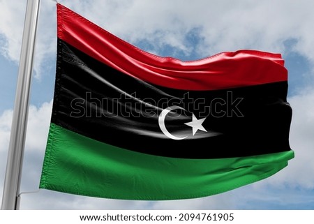 The flag of Libya was originally introduced in 1951, following the creation of the Kingdom of Libya.  Royalty-Free Stock Photo #2094761905