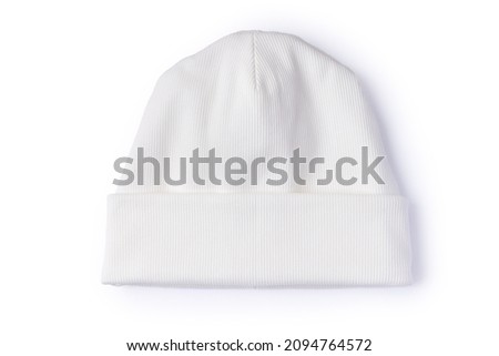 White beanie hat isolated on white background. Top view of trendy youth headwear Royalty-Free Stock Photo #2094764572