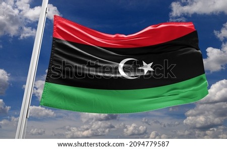 The flag of Libya was originally introduced in 1951, following the creation of the Kingdom of Libya.  Royalty-Free Stock Photo #2094779587