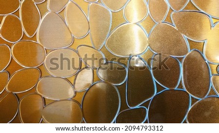 Gold plated background in the form of drops