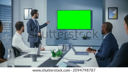 Office Conference, Meeting Presentation: Digital Startup Entrepreneurs Talks, Uses Green Screen Chroma Key Wall TV. Successfully Presenting e-Commerce Product to Group of Multi-Ethnic Investors