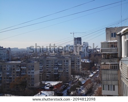 Winter in the city. Residential buildings in the post-Soviet style. Soviet architecture. Soviet panel houses.
Odessa, Ukraine. Buildings in the snow.
Aerial view of winter city covered with snow.