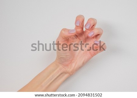 Hands with convulsions and muscle spasms, at the time of an epileptic seizure Royalty-Free Stock Photo #2094831502