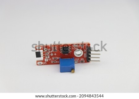 magnetic field sensor module for arduino projects with variable potentiometer on board isolated on white background Royalty-Free Stock Photo #2094843544