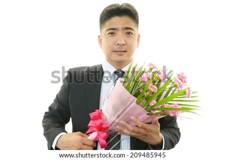 Man holding flower bouquet 