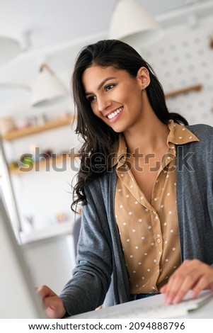 Beautiful young woman working on computer. Technology, people, work, study concept