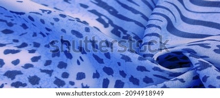 silk fabric with blue white stripes, zebra skin in African style. For the designer, the sketch of the layout, the entourage of the decorator. Background texture collection