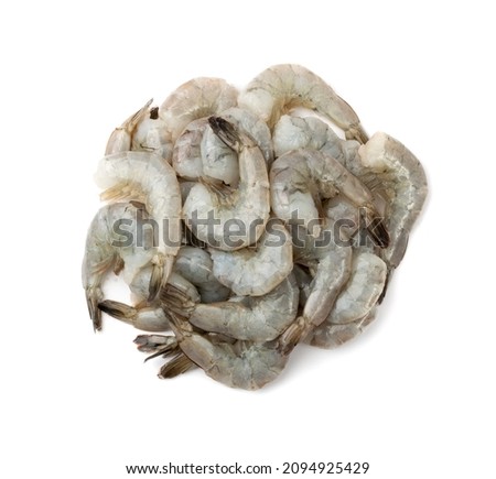 Fresh shrimp tails isolated. Raw headless prawn pile, pacific shrimp, uncooked tiger prawns, jumbo seafood on white background top view