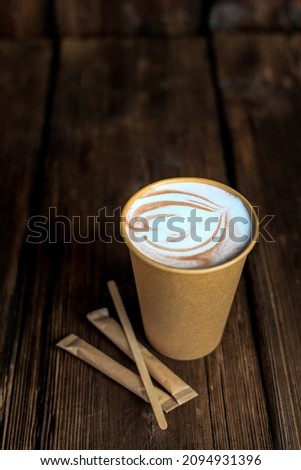 Latte, coffee in a glass with a picture. Hot drink.