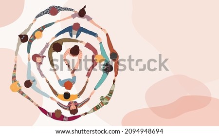 Group of people in circle from diverse culture holding hands.Cooperation and teamwork.Community of friends or volunteers committed to social issues for peace and the environment.Top view Royalty-Free Stock Photo #2094948694