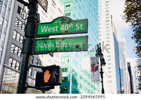 Street sign in New York, avenue of America