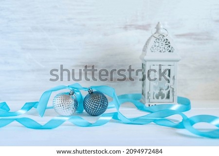 Christmas decorations on white wooden background.