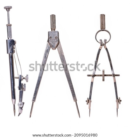 Metal compasses for marking circles. Accessories for draftsmen. 