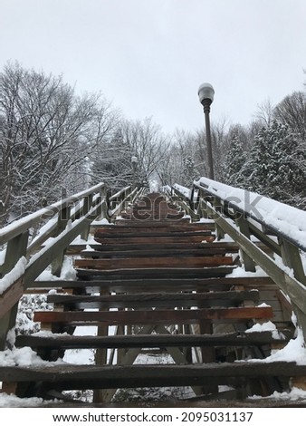 Stairs covered in snow in winter