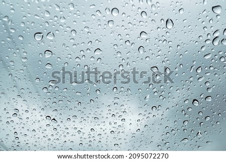 Rain drops on the glass window