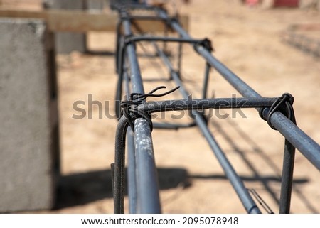 Reinforcement steel are bind by binding wire in construction site. Royalty-Free Stock Photo #2095078948