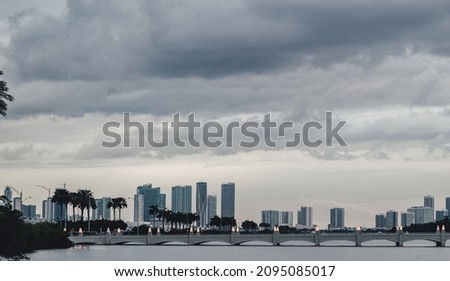 A highway in a city under the cloudy sky