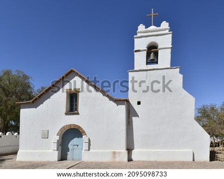 An exterior view of the Church of San Pedro de Atacama with a bell-cote, Chile Royalty-Free Stock Photo #2095098733