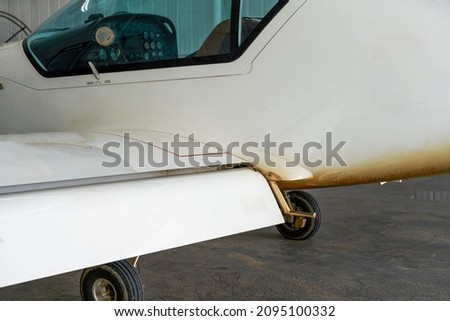Close-up of part of the fuselage of a small aircraft Royalty-Free Stock Photo #2095100332