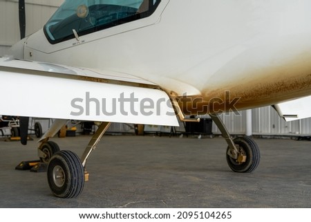 Close-up of part of the fuselage of a small aircraft Royalty-Free Stock Photo #2095104265