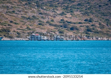 A view of the seashore across the water, Crete island, Greece