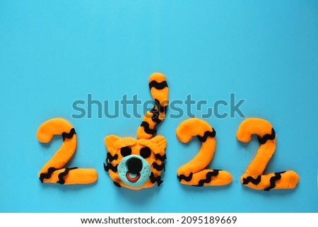 new year card with 2022 year of the tiger from plasticine