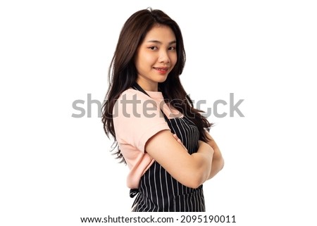 Portrait of confident asian woman barista standing on white background. female confidently starting a new business