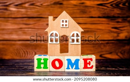 Wooden home and text on the cubes home 