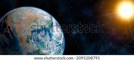 Planet Earth in Starry Sky of Solar System in Space. Planet Earth with American continent in outer space. Panoramic view of the Earth. Elements of this image furnished by NASA