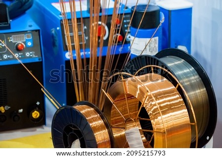 Copper welding wire for welding. Royalty-Free Stock Photo #2095215793