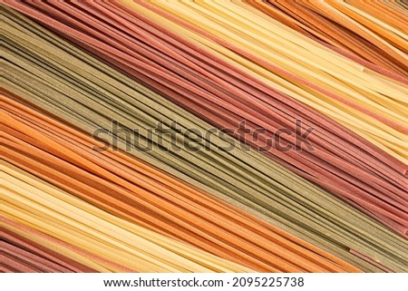 Italian vegetable flat pasta closeup image as a background. Top horizontal view. Flat lay picture.
