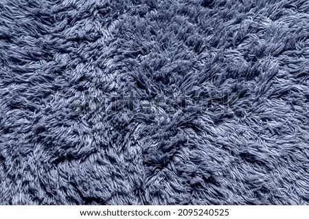 background with a shaggy carpet structure in blue and navy blue, a universal background for various projects