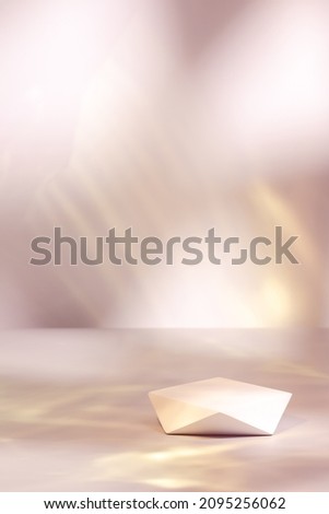 Abstract surreal scene - empty stage with white polygonal podium on pastel pink and gold colored background. Pedestal for cosmetic product packaging mockups display presentation Royalty-Free Stock Photo #2095256062
