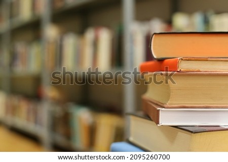 Books on the table in library. School books
