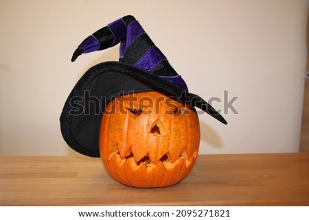 Carved Halloween Pumpkin with Witch Hat