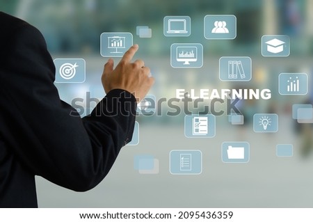 businessman hand touching a virtual screen, business icon. E-learning Online Education Internet Technology Business Concept.