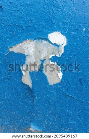 Old oily blue cracked paint wall