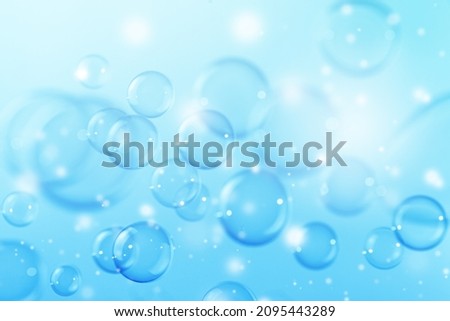 Beautiful Transparent Shiny Blue Soap Bubbles Background. Celebration, White Bokeh Bubbles Backdrop. Christmas Wallpaper.	