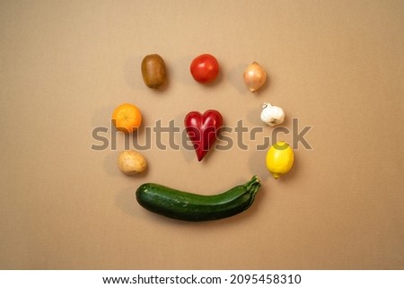 vegetables and fruit from top view with heart in the middle
