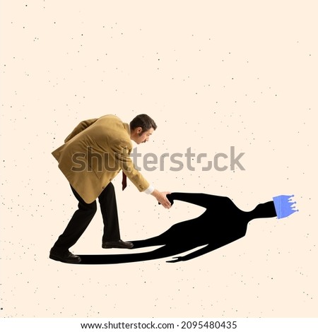 Contemporary art collage of businessman holding hand of his shadow and helping it to stand up. Relying on yourself. Concept of self help, assistance, self-motivation, self-development and ad Royalty-Free Stock Photo #2095480435