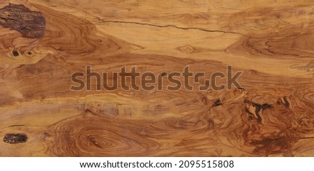 wenge oak, a flat surface of natural wood with a rich close-up pattern. plywood textured wooden background or wood surface of the old at grunge dark grain wall texture of panel top view. Vintage teak.
